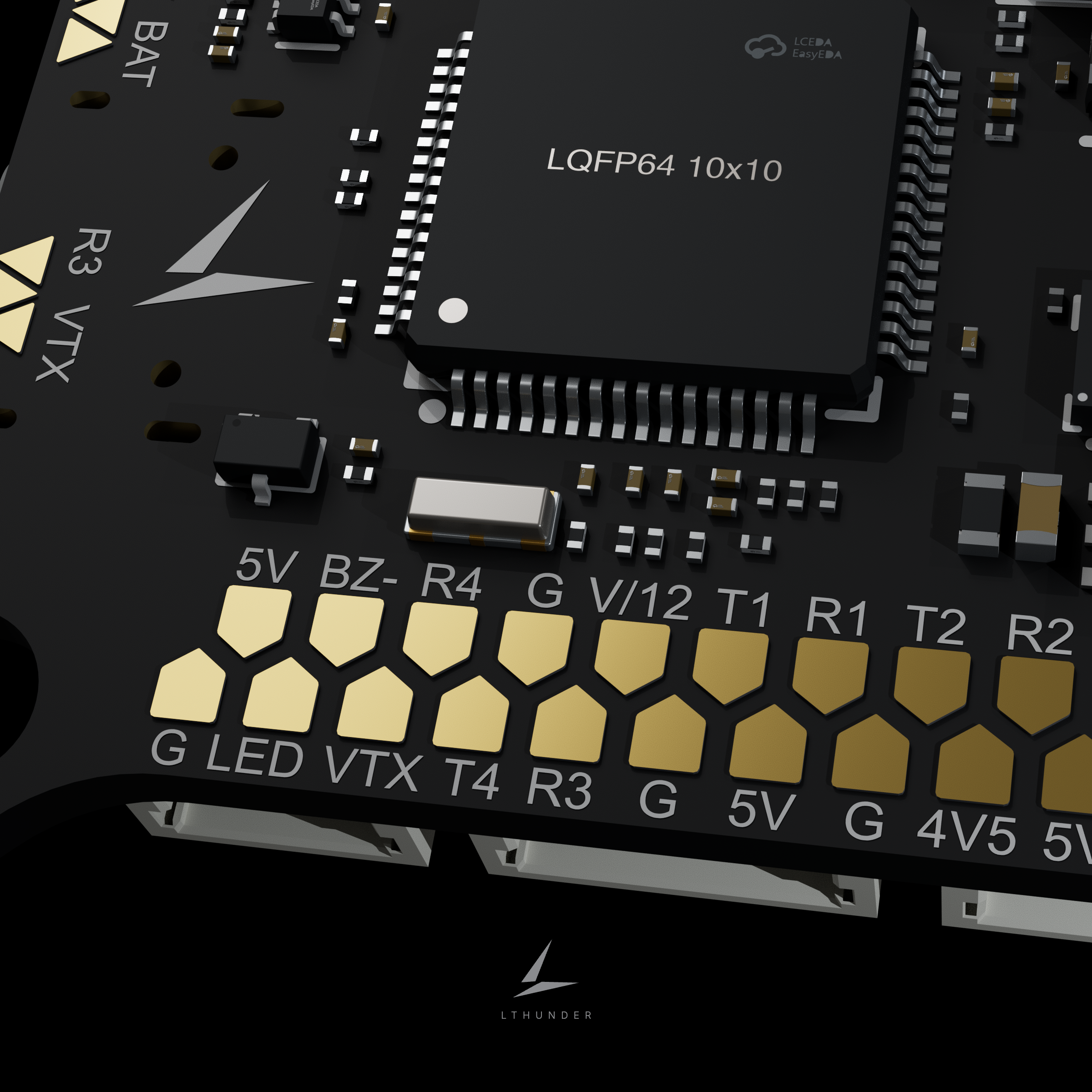 Close-up of the flight controller chip, board logo and solder pads.